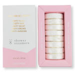 Pink and white box of shower steamers with gold lettering