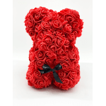 Red rose teddy bear with a black ribbon bow
