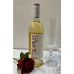 Bottle of white wine beside a red rose and two champagne flutes