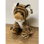 Plush tiger stuffed animal sitting on a wooden surface