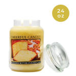 Almond butter pound cake candle in a clear jar with a lid