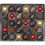 Box of assorted chocolates in paper cups