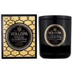 Black candle jar and matching boxed candle labeled Freesia Clementine
