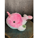 Pink and white plush narwhal toy with a glittery horn