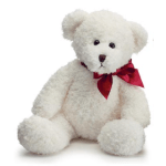 White teddy bear with a red ribbon bow