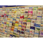Rows of greeting cards displayed on a store rack