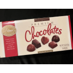 Box of assorted chocolates with red and cream packaging