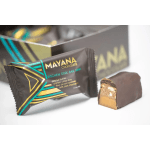 Wrapped chocolate bar with a cut piece showing caramel and nuts