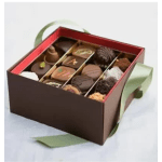 Box of assorted chocolates with a ribbon handle