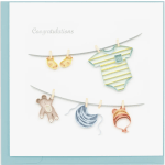 Paper baby clothes and toys clipped on a line with a congratulations message