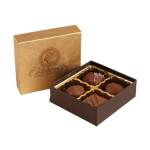Box of assorted chocolates with a gold lid and brown tray