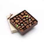 Box of assorted chocolates in a brown gift box
