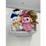 Basket of plush teddy bears wearing graduation caps