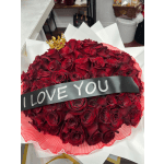 Large bouquet of red roses with a crown and "I LOVE YOU" ribbon