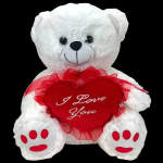 White teddy bear holding a red heart with "I Love You" text
