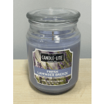 Lavender-scented jar candle with a glass lid