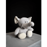 Gray plush elephant toy sitting on a surface