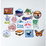 Assorted outdoor-themed stickers on a white surface