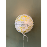 Round white balloon with gold scrollwork and "Happy Anniversary" text