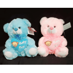 Blue and pink teddy bears holding baby-themed hearts