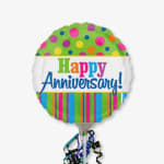 Round anniversary balloon with colorful polka dots and stripes
