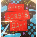 Decorative sign with the words "HAPPY BOSS'S DAY!"