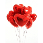 Cluster of red heart-shaped balloons on thin strings