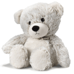 Plush teddy bear with white and gray fur sitting on a white background