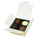 Box of assorted chocolates in a white gift carton