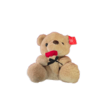 Plush teddy bear holding a red rose with a black ribbon