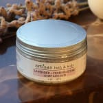 Jar of lavender and frankincense bath salts on a table