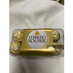 Box of Ferrero Rocher chocolates in gold wrappers