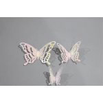 Three pastel butterfly wall decals on a gray background
