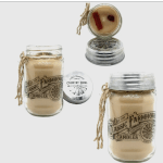 Set of beige candles in glass jars with metal lids and twine ties