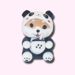 Panda plush toy holding a cup on a pink background