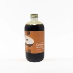 Bottle labeled Espresso Martini on a white background