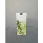 Box of eucalyptus body lotion with green botanical artwork