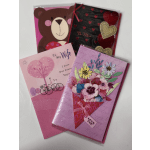 Three decorated greeting cards with hearts and flowers are stacked on a white surface.