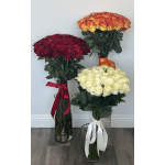 Three large rose bouquets in glass vases, in red, orange-yellow, and white