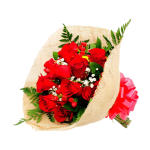 Bouquet of red roses with white filler flowers wrapped in burlap with a red bow