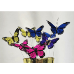 Colorful butterfly picks arranged in a gold vase