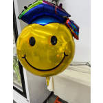Yellow smiley-face balloon with a colorful graduation cap