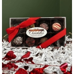 Box of assorted chocolates tied with a red ribbon