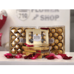 Ferrero Rocher chocolate gift boxes with rose petals in front