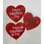 Red heart-shaped Valentine signs on sticks