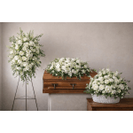White floral funeral casket spray, standing spray, and basket arrangement