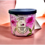 Pink floral scented candle in a black-lidded jar