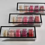 Boxes of assorted macarons in clear packaging