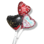 Three heart-shaped foil balloons with love messages