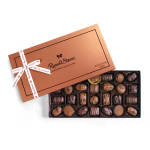 Box of assorted chocolates with a ribbon tied around it